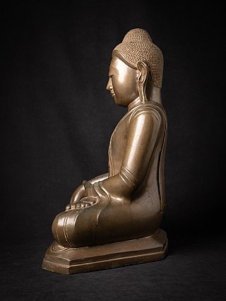 Burmese bronze Buddha statue seated, left side profile with base