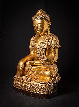 Wooden Mandalay Buddha statue from Burma (Myanmar), seated, three-quarter left view
