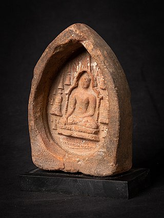 Bagan votive tablet with seated Buddha relief in a niche, three-quarter left view