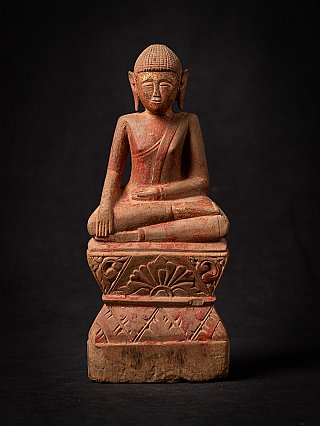 Thai wooden Buddha statue seated in bhumisparsha mudra, full front view