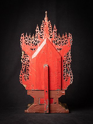 Burmese wooden throne, rear view with red backboard and pierced cresting