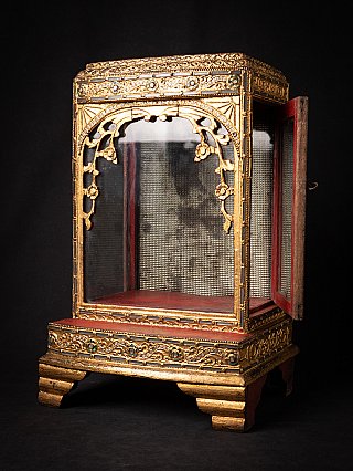 Wooden Buddha temple shrine from Myanmar, three-quarter view with side door open