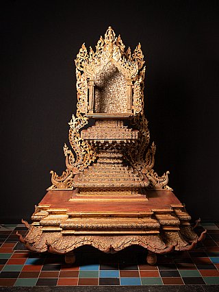 Wooden Burmese Buddha throne, front view showing the ornate open shrine niche