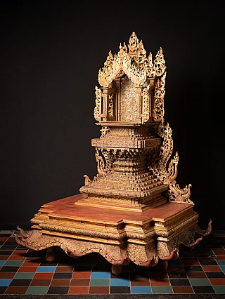 Large wooden Burmese Buddha throne, Shan style, three-quarter view with open niche