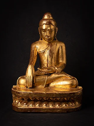 Burmese wooden Buddha statue on lotus base, seated in bhumisparsha mudra, full front view