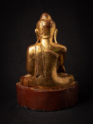 Burmese wooden Buddha statue, rear view showing back and robe drape