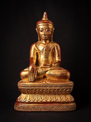 Burmese wooden Buddha statue seated in bhumisparsha mudra, full front view