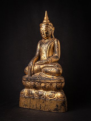 Shan Burmese Buddha statue in wood with pointed ushnisha, three-quarter left view
