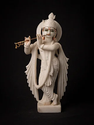 Old marble Krishna statue