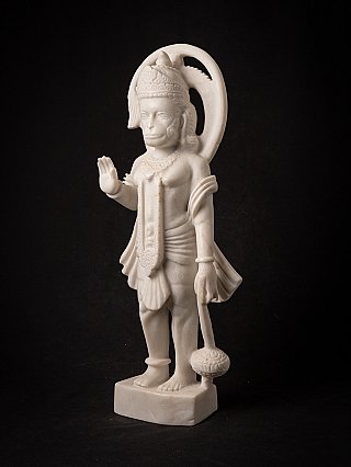 Marble Hanuman statue from India in three-quarter view, holding a mace by the leg