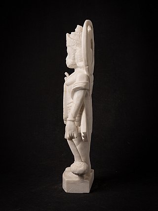 White marble Hanuman statue, side profile showing the back halo ring and mace