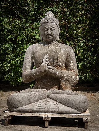 Large Indonesian lava stone Buddha statue seated in dharmachakra mudra, full front view