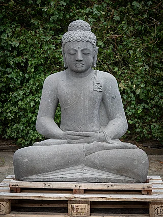 Buddha statue in lavastone from Indonesia, seated in dhyana mudra, full front view