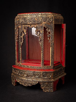 Wooden Buddha shrine from Myanmar, angled front view with open side panel and red lacquer