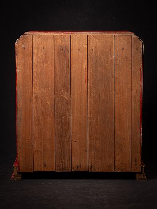 Antique wooden Burmese temple shrine, rear view with plain wooden boards