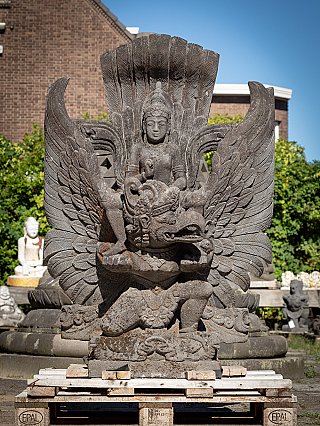 Vishnu statue on Garuda in Indonesian lavastone, full front view with wide spread wings