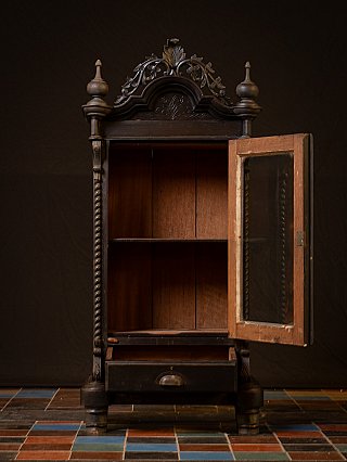 Wooden temple cabinet from Myanmar with open glass door and pulled-out drawer, front view