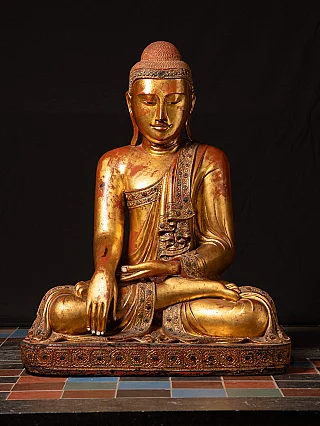 Large wooden Buddha statue in bhumisparsha mudra, Mandalay style, full front view