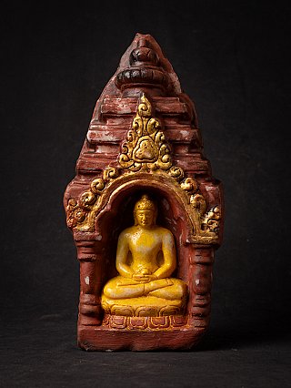 Thai marble Buddha statue seated in dhyana mudra within arched niche, full front