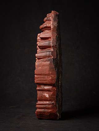 Side view of the marble niche sculpture with stepped edges, Buddha not visible