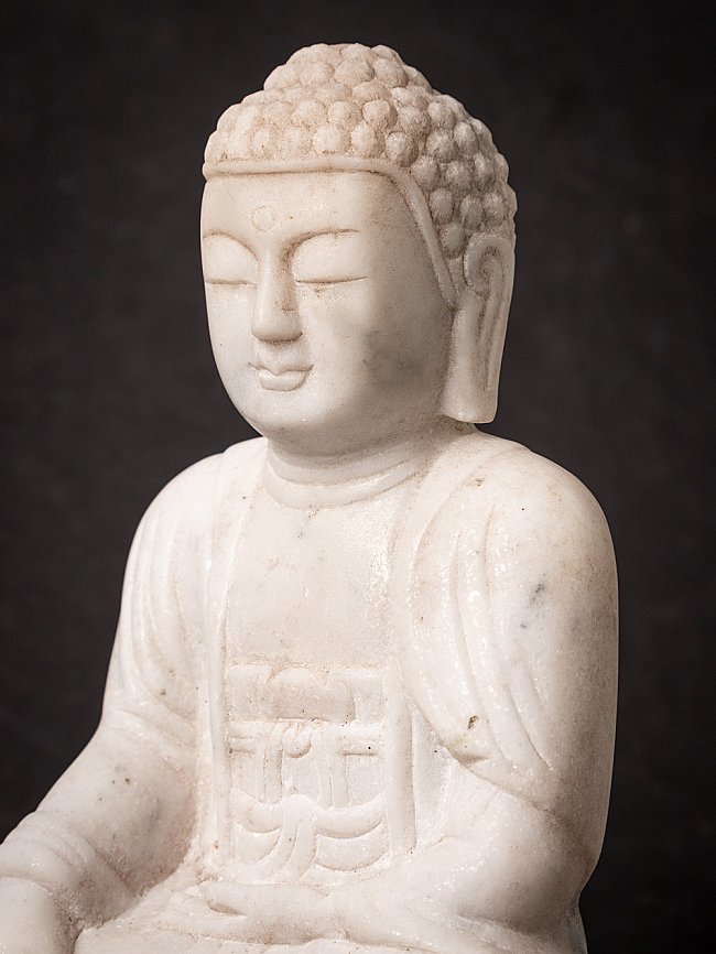 Old marble Buddha statue from Burma