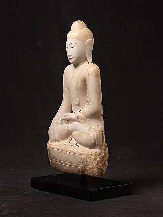 Marble Buddha statue from Burma (Myanmar), three-quarter left view with rough base