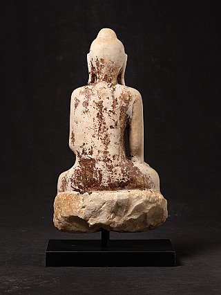 Seated Burmese marble Buddha statue, rear view with dark patina on the back