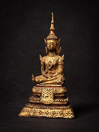 Bronze Thai Buddha statue in Rattanakosin style, seated, three-quarter view