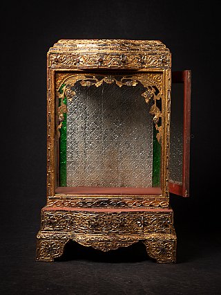 Wooden temple shrine from Myanmar, front with right-side glass door opened