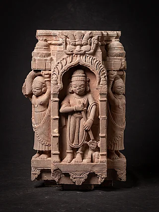Wooden Jain temple fragment from India with a standing figure under an arch, front view