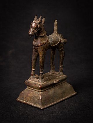 Antique Indian bronze horse statue on pedestal base, front three-quarter view