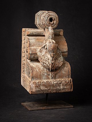 Antique Indian wooden temple fragment, three-quarter view with circular mortise
