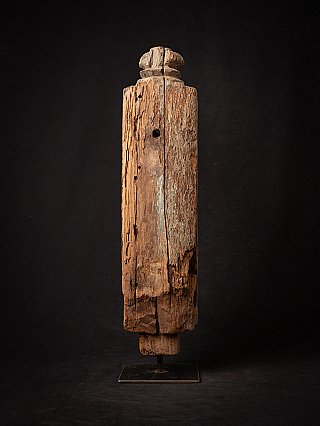 Rear view of the antique Indian wooden panel with cracks and old drill holes