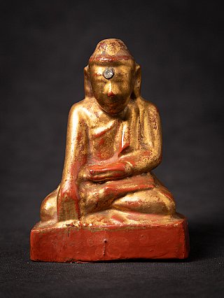 Burmese wooden Buddha statue, gilded, seated in bhumisparsha mudra, full front view