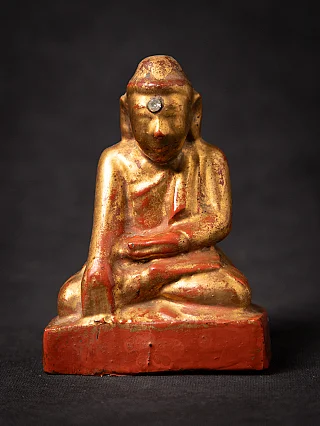 Burmese wooden Buddha statue, gilded, seated in bhumisparsha mudra, full front view