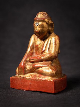 Wooden Buddha statue from Burma (Myanmar), gilded, seated, three-quarter left view