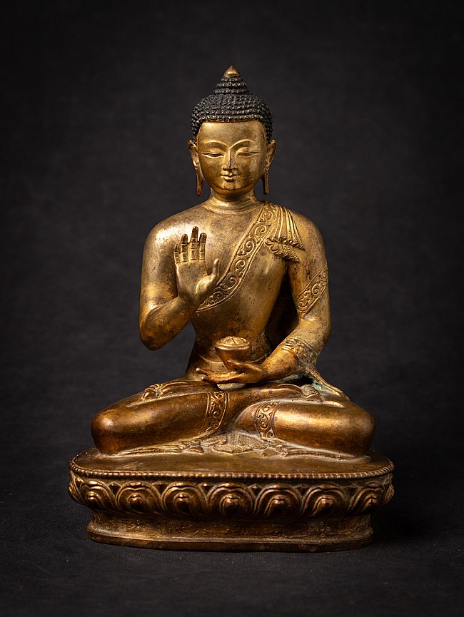 Old bronze Nepali Buddha statue