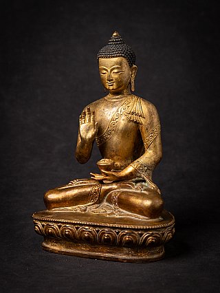 Old bronze Nepali Buddha statue