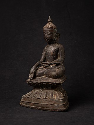 Bronze Burmese Shan Buddha statue, seated on tiered base, three-quarter view