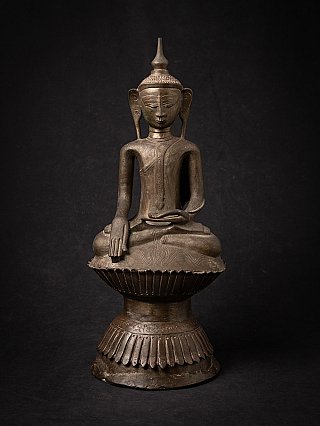 Burmese Buddha statue in bronze, seated in bhumisparsha mudra, full front view