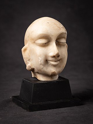 Antique Indian Jain marble head (JA-163), three-quarter view from the right