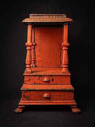 Wooden Indian temple shrine with open niche and two drawers, full-front view