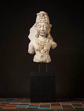 Marble Avalokiteshvara statue bust from India on stand, full front view