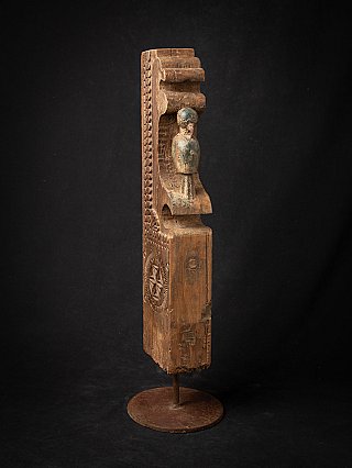 Antique Indian wooden temple fragment (19th century), three-quarter view with projecting small figure