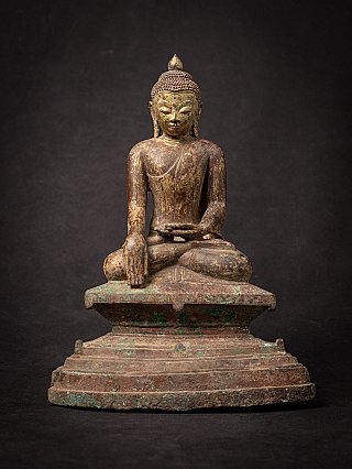 Burmese Ava bronze Buddha statue seated on a stepped base, full-front view