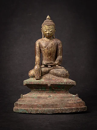 Burmese Ava bronze Buddha statue seated on a stepped base, full-front view