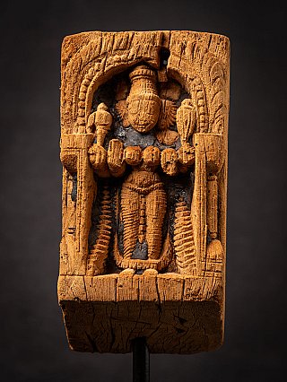 Detail view of the Parvati relief on the wooden panel, frontal composition