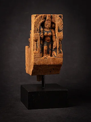 Antique Indian Parvati wooden panel, standing figure in shrine niche on black display base