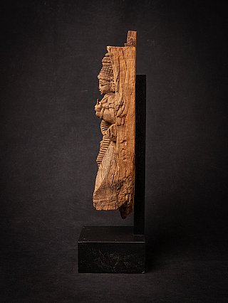 Devi wooden panel statue from India, side profile view showing the panel thickness