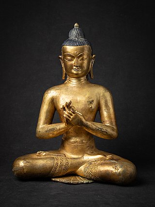 Nepalese bronzen Boeddha in zittende houding met dharmachakra mudra, vooraanzicht
